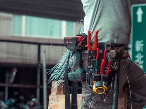 Handyman wearing a loaded tool belt